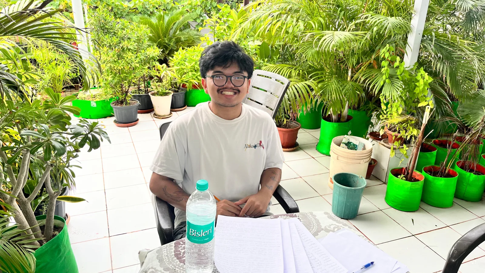 Indian Lingua student studying on a green terrace at a Jaipur homestay